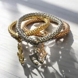 Elegant Gold and Silver Music Note Bracelets